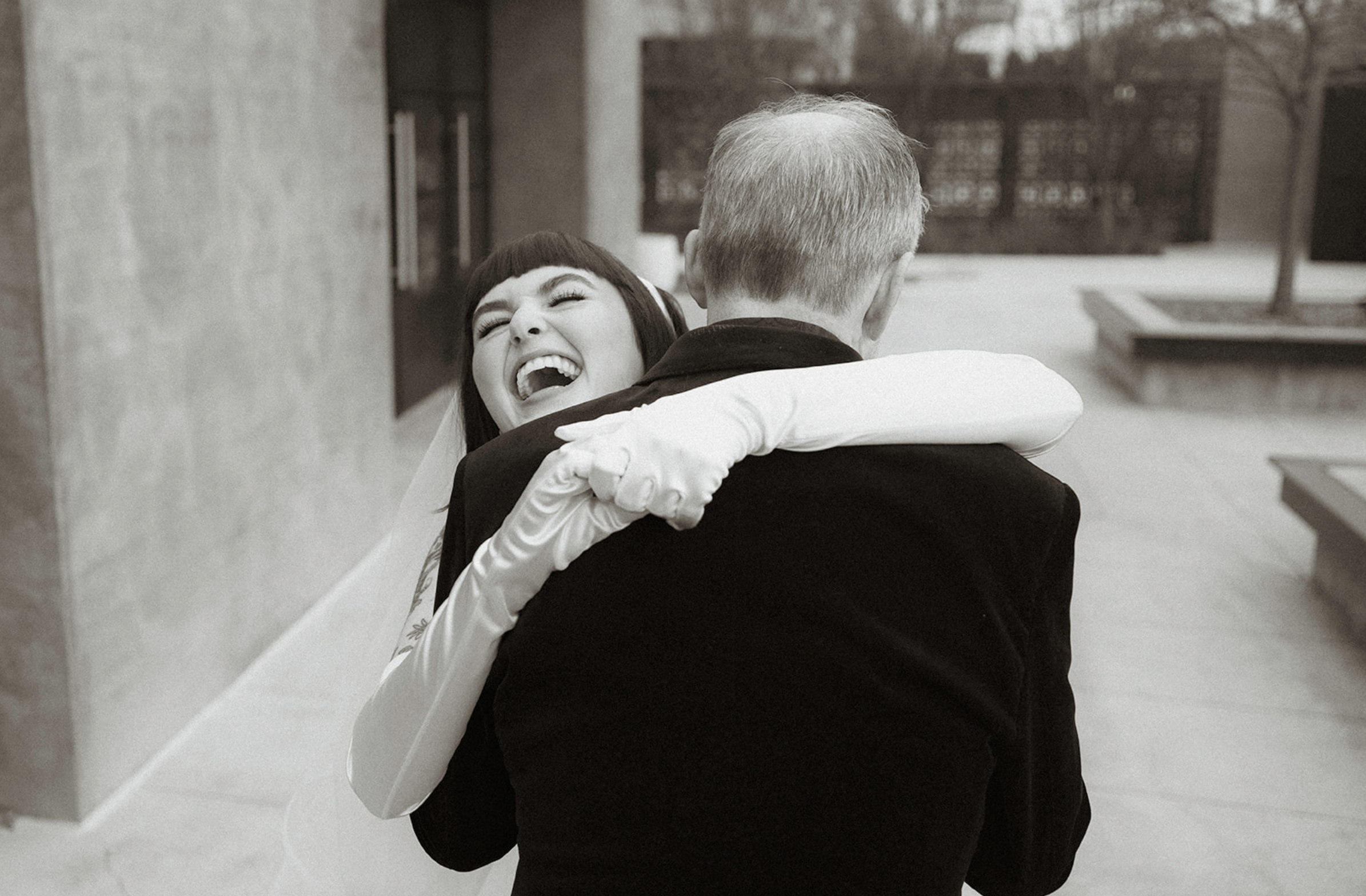 Emotional first look between bride and father inside Clementine Hall